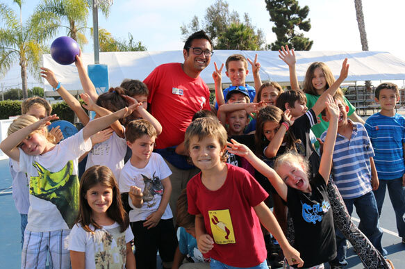 Camp photo of campers with a camp instructor