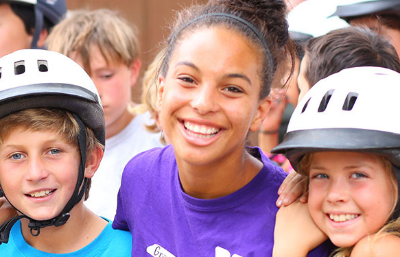 kids smiling side hug