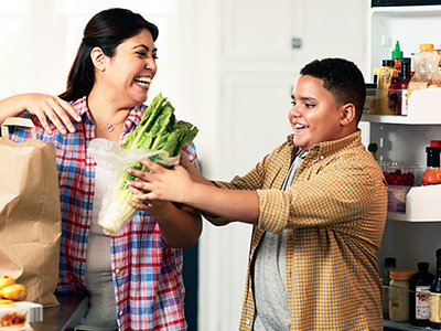 Photo of a mother and son choosing to eat healthy