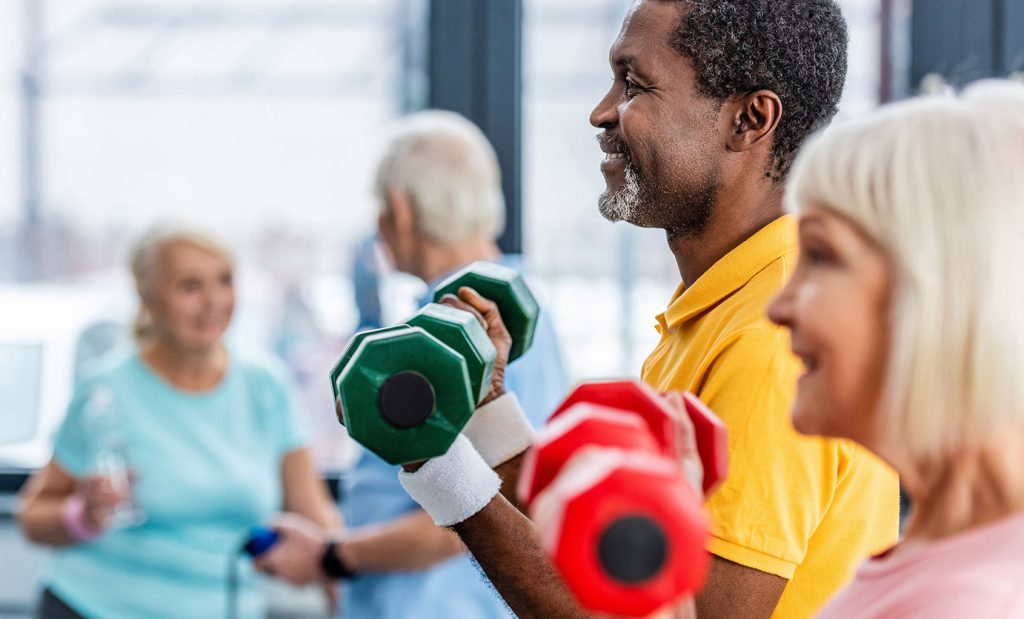 Photo of adults exercising together at the YMCA