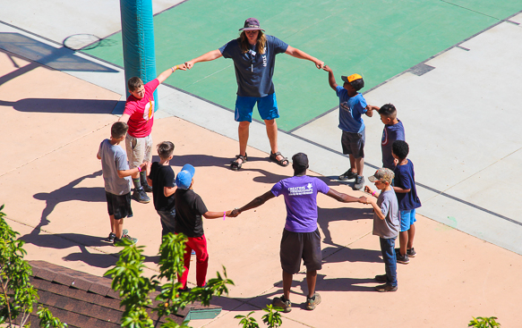 group of boys in circle