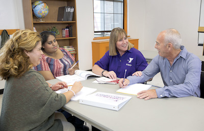 Photo of a training workshop on an office meeting desk