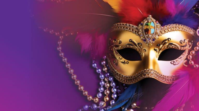 decorative mardi gras mask with beads