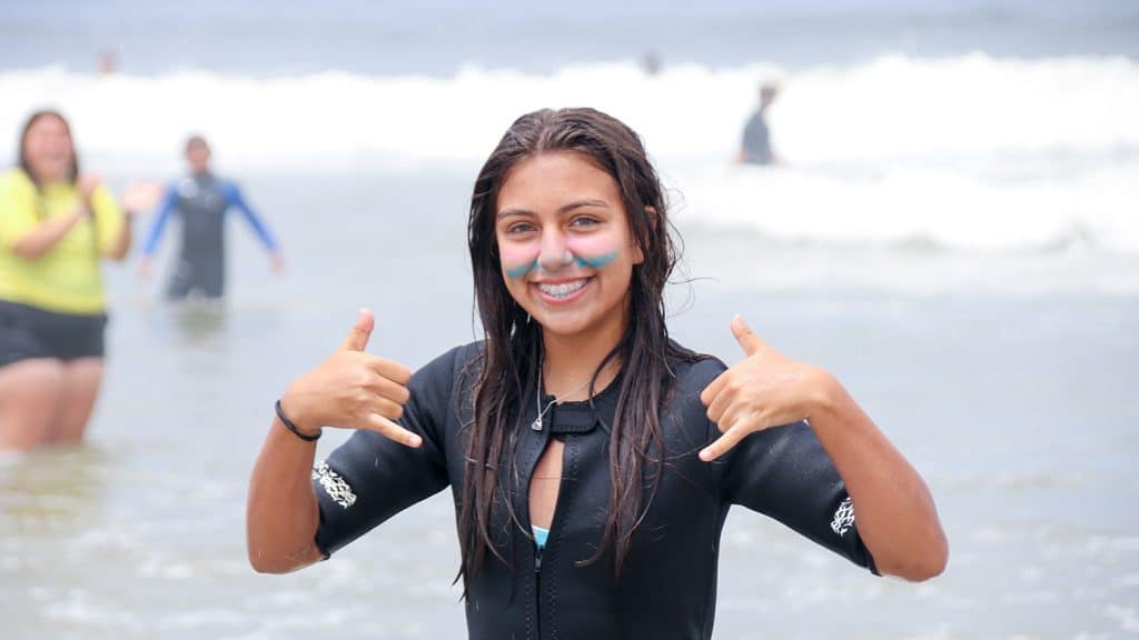 camp girl in ocean