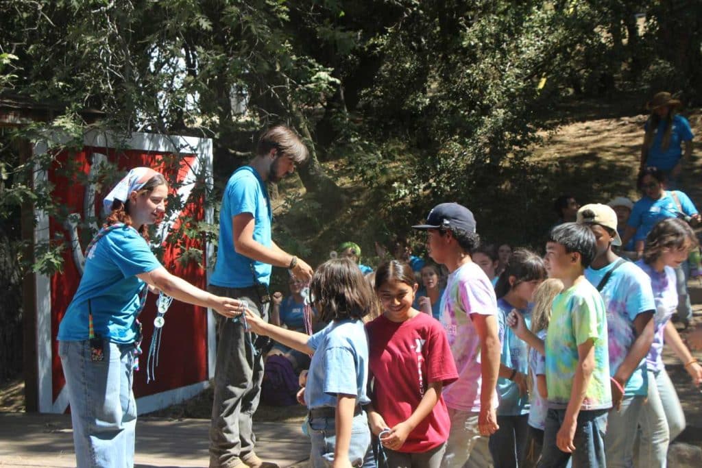 Campers and counselors playing games