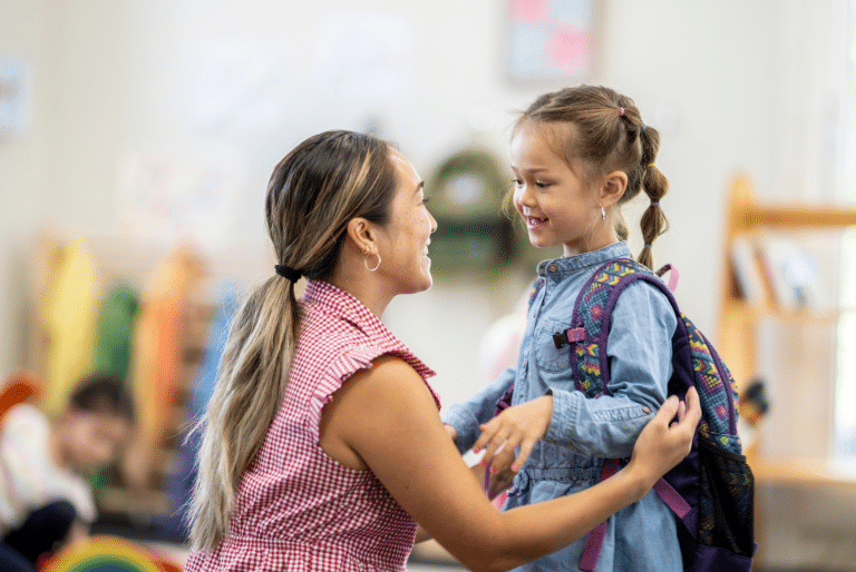 parent dropping off child at preschool