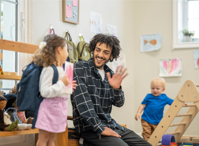 parent dropping off child at preschool