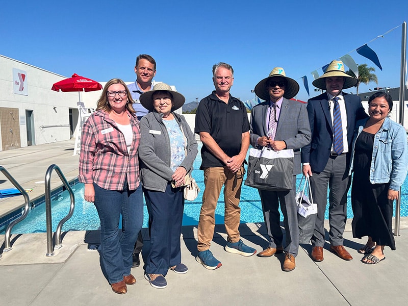 Times Advocate image of Escondido pool with Y staff and EUSD reps