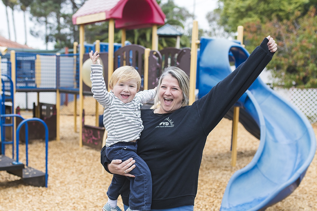 mom with child at playground